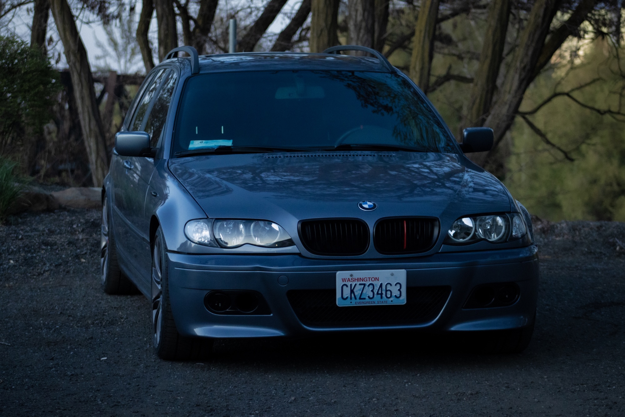 BMW E46 front shot with overcast reflection