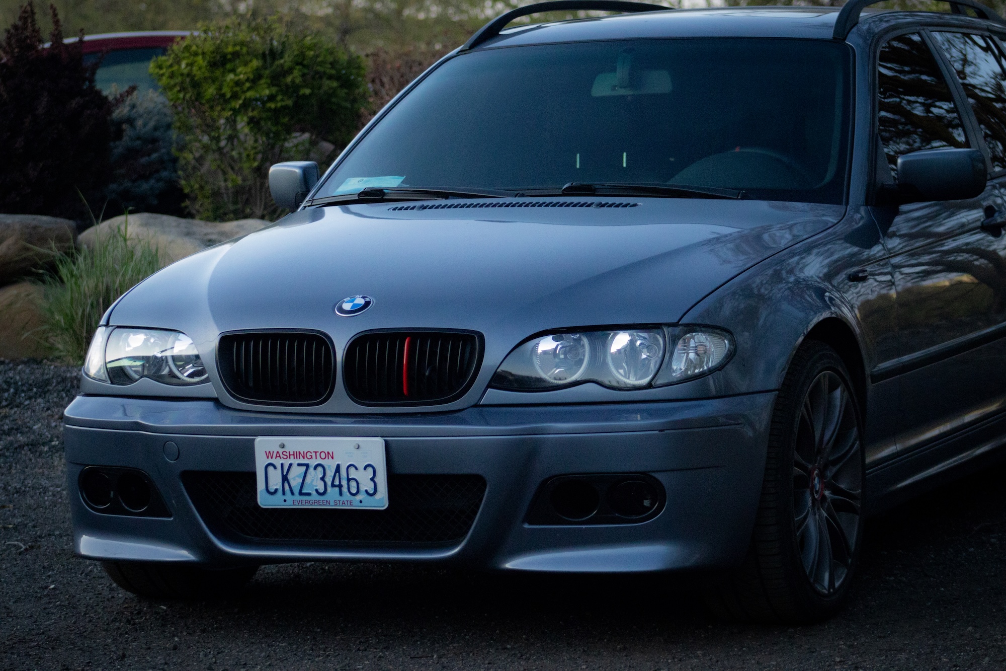 BMW E46 side angle with subtle reflection in the body