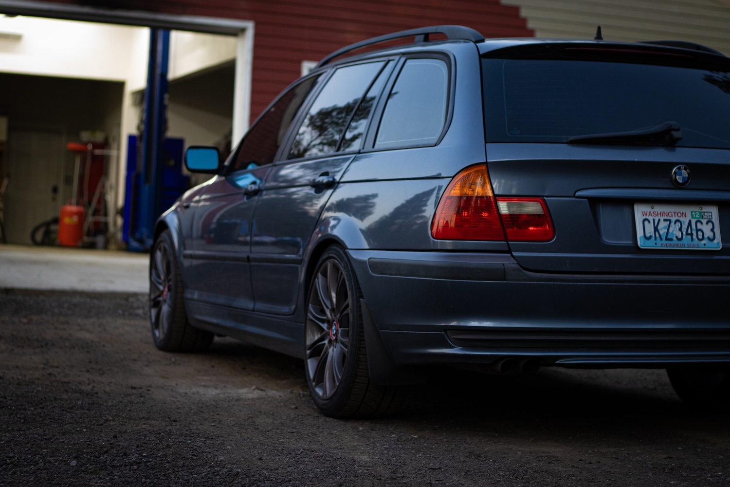 BMW E46 Wagon front view under trees