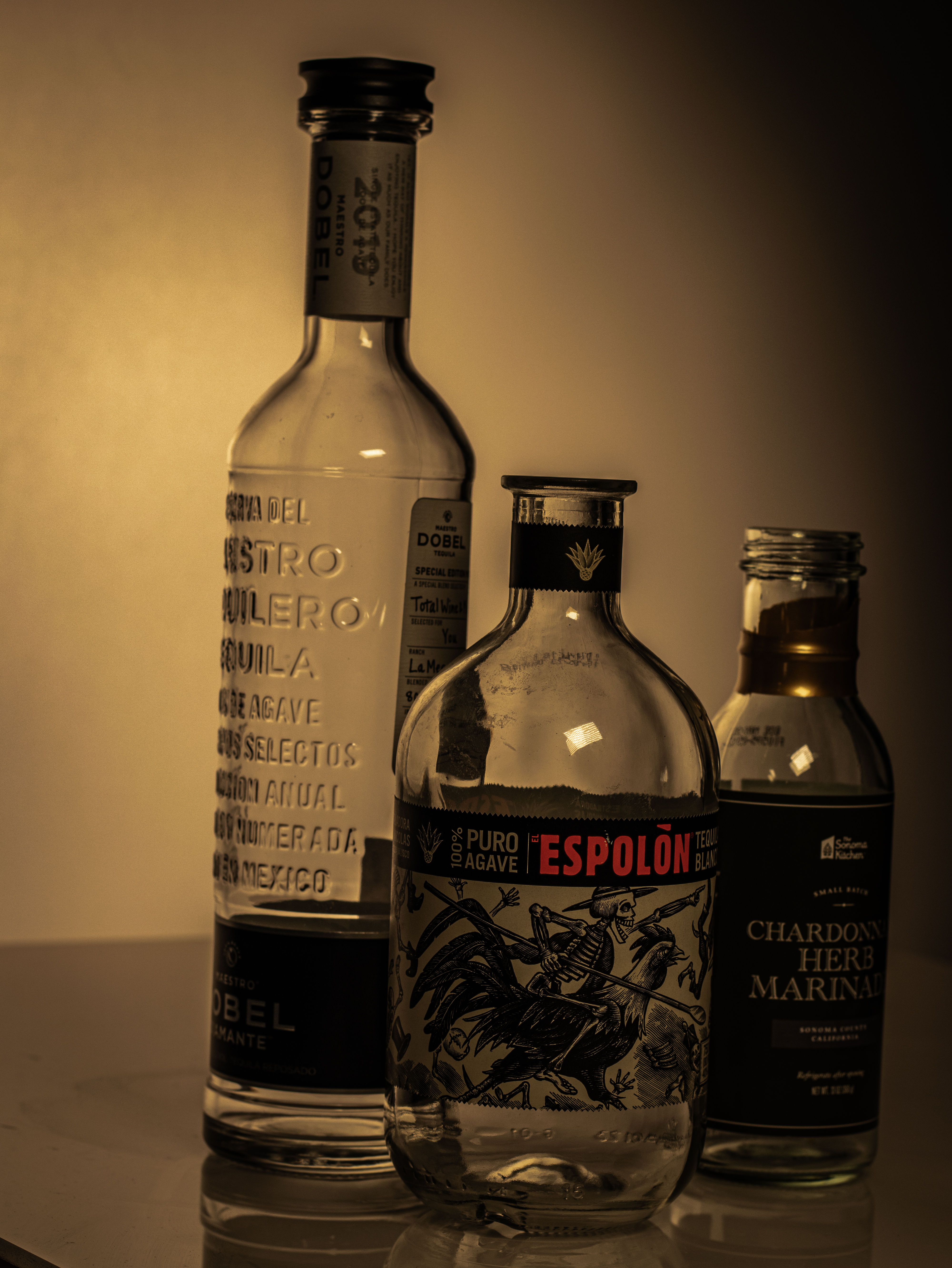 Two bottles in golden hour light
