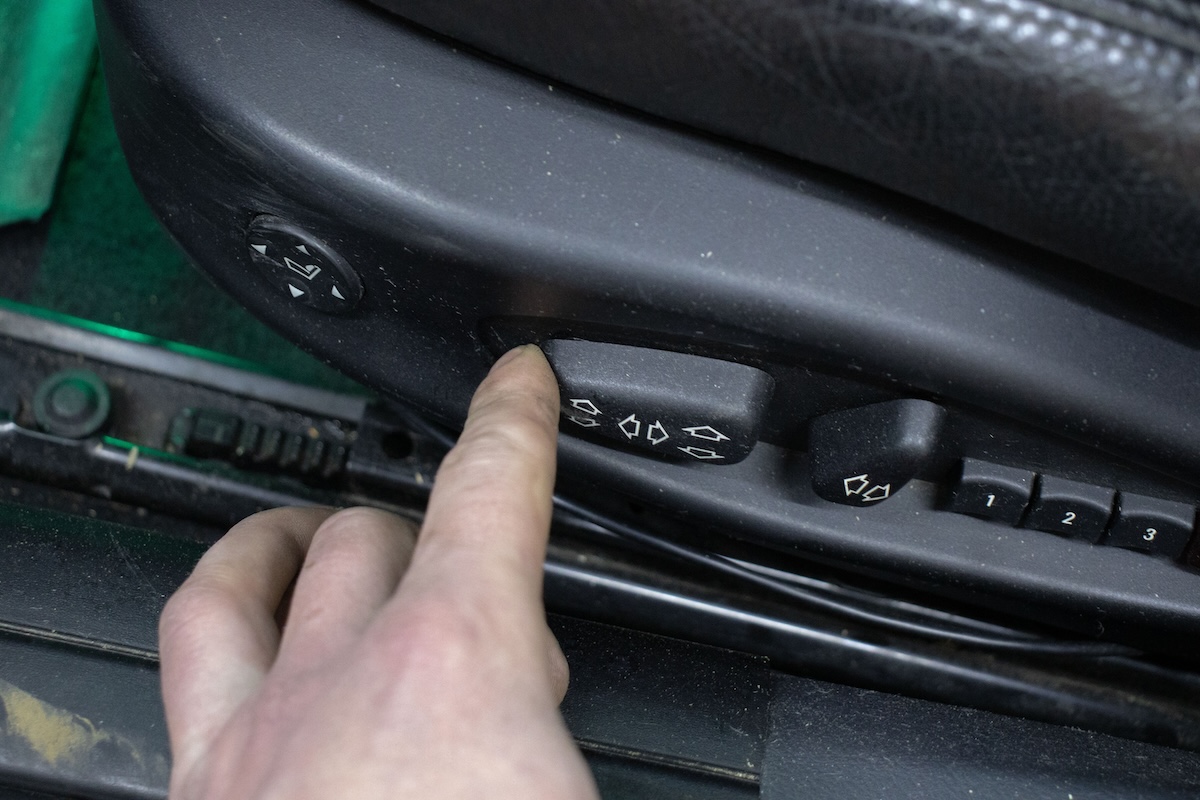 Moving seat back to access bolts