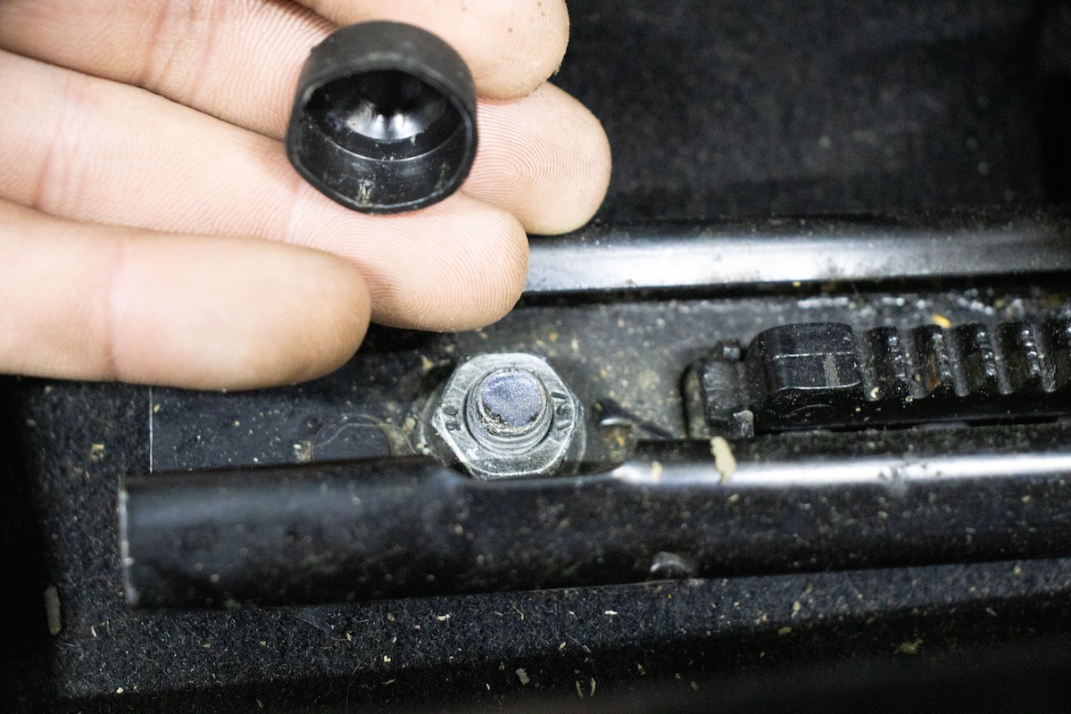 Front bolt cap removed